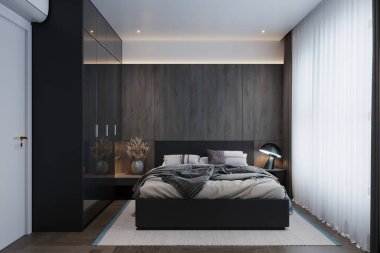 Çağdaş bir yatak odasında ana yatak odasının köşesinde büyük boy rahat bir yatak bulunur.