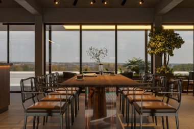 Minimalist Mobilya ve Büyük Pencereli Konforlu Modern Kafe İçi