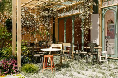 Çiçek açan ve rahat oturaklı Büyüleyici Açık Cafe