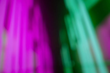 Arka plan renkli bokeh bir bilgisayar ekranı ve ışıklar tarafından yakalandı. Görüntüyü çoğunlukla kırmızı, mavi, sarı ve siyah olarak bulanıklaştır.