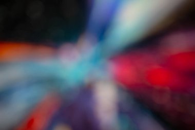 Arka plan renkli bokeh bir bilgisayar ekranı ve ışıklar tarafından yakalandı. Görüntüyü çoğunlukla kırmızı, mavi, sarı ve siyah olarak bulanıklaştır.