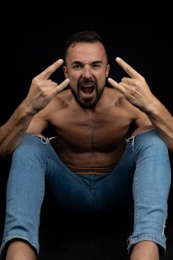 Shirtless man wearing jeans cuckolding with hands and screaming clipart