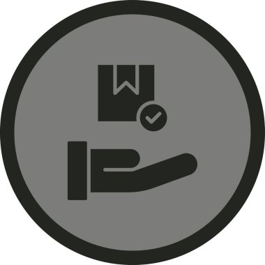 Yuvarlak bir damgayı tutan el.