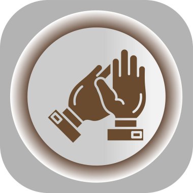 Taşınabilir bir simgeyi kabartma biçiminde tutan el.