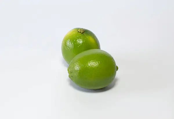 Közelkép Kép Két Lime Fehér Háttér — Stock Fotó