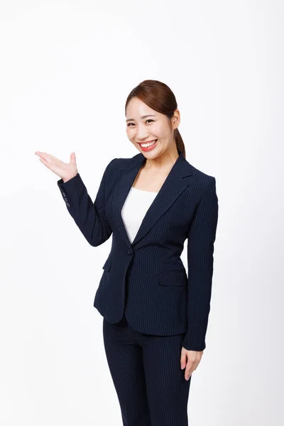 Studio Shot Beautiful Japanese Businesswoman Showing Something Hand White Background — Stock Photo, Image