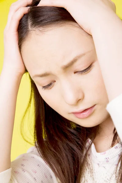 Young Asian Sad Woman Isolated Yellow Background — Stock Photo, Image
