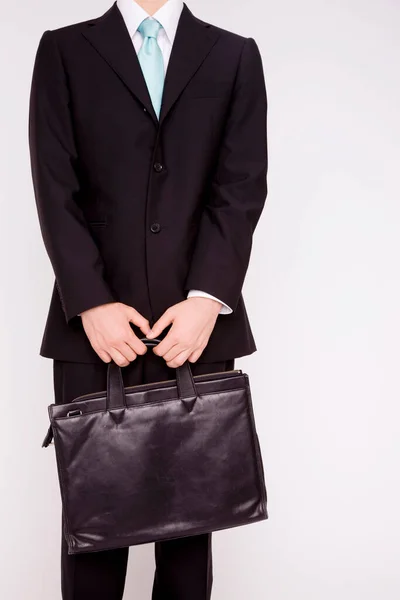 Junger Geschäftsmann Mit Tasche Vor Isoliertem Hintergrund — Stockfoto