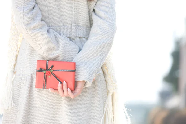 Cropped Photo Woman Holding Red Gift Box Behid Her Back — Stock Photo, Image