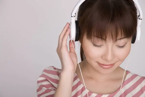 Young Asian Woman Listening Music Headphones Stock Image