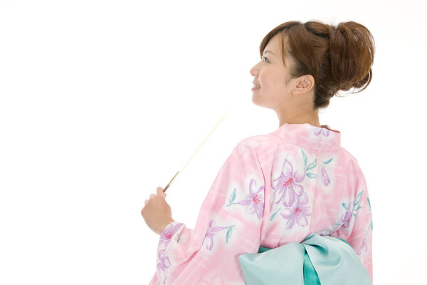 Beauty woman in traditional Japanese dress on white background 