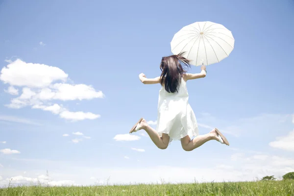 Back View Beautiful Young Woman Dress Holding White Umbrella Jumping — Stock Photo, Image