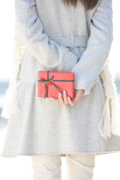 Cropped Photo Woman Holding Red Gift Box Behid Her Back — Stock Photo, Image
