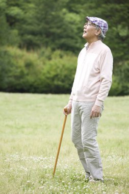 Bastonlu yaşlı bir Japon 'un portresi.