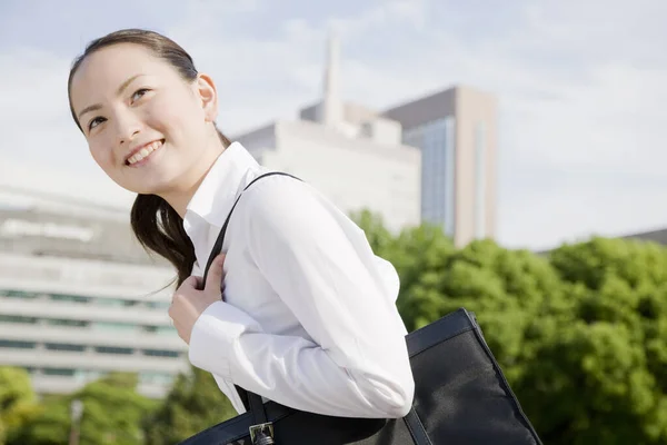 Beautiful Young Asian Woman Smiling Holding Bag Outdoors — Stock Photo, Image