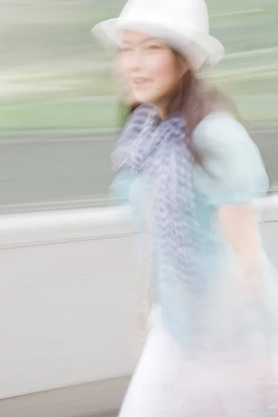 Blurred View Beautiful Young Asian Woman Running Outdoors — Stock Photo, Image