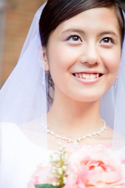 Güzel Asyalı gelin portresi düğün sabahı