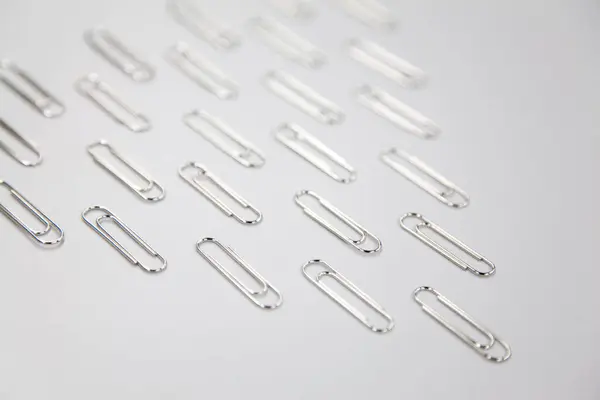 Silver Paper Clips White Background — Stock Photo, Image