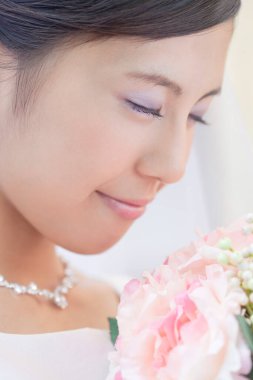 Güzel Asyalı gelin portresi düğün sabahı