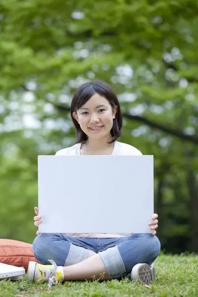 Asian Woman Holding Blank Sign — Stock Photo, Image