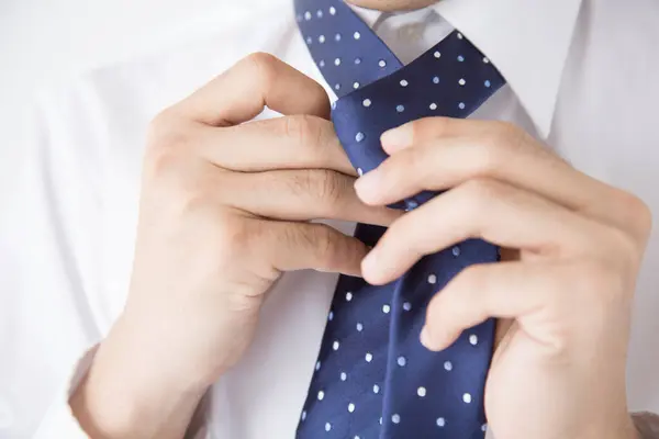 Close Man Shirt Adjusting Tie — Stock Photo, Image