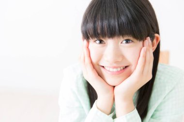 gülümseyen Asyalı kız portreyi yakından çek