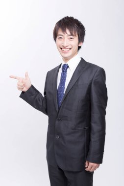 Asyalı genç bir işadamının portresi