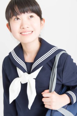 Okul üniformalı güzel bir Japon öğrencinin portresi. 