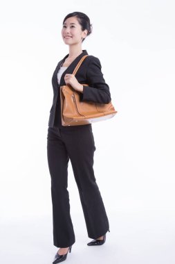 Asyalı genç iş kadınının stüdyo portresi 