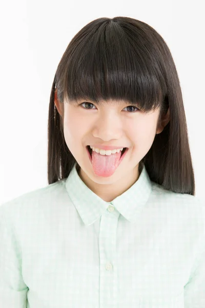 Jovem Asiático Menina Estudante Mostrando Língua Isolada Fundo Branco — Fotografia de Stock