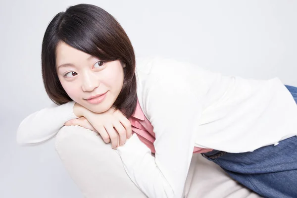 Joven Asiático Mujer Silla Blanco Fondo — Foto de Stock