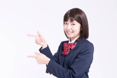 Gülümseyen Asyalı kız öğrencinin portresi