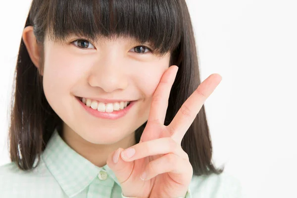 Młody Azji Dziewczyna Student Pokazując Znak Izolowane Białym Tle — Zdjęcie stockowe
