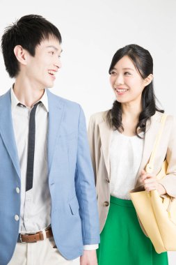 Beyaz arka planda genç Asyalı iş adamları 