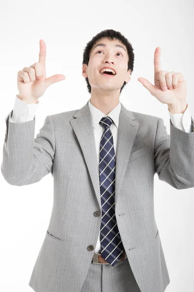 Close Retrato Jovem Empresário Japonês Apontando Para Cima — Fotografia de Stock