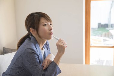 close up asian woman with electronic cigarette