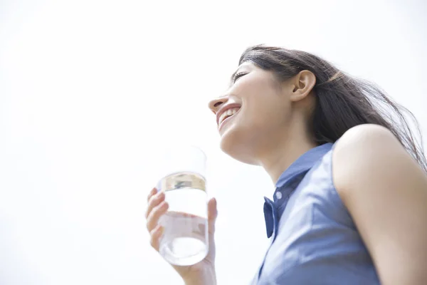 Young Asian Woman Drinking Water Outdoors — Stock Photo, Image