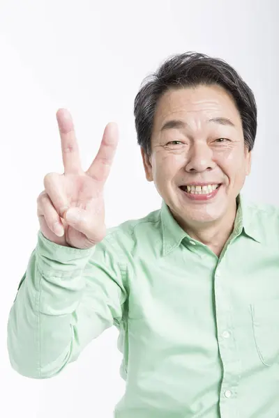 Starszy Azji Biznesmen Pokazując Ręka Gest — Zdjęcie stockowe