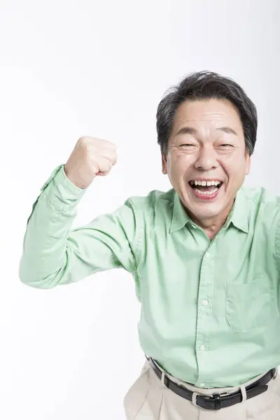 Starszy Azjatycki Biznesmen Świętujący Sukces — Zdjęcie stockowe