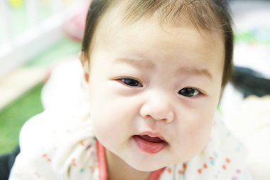 Güzel bebek yüzü portresi, Asyalı bebek