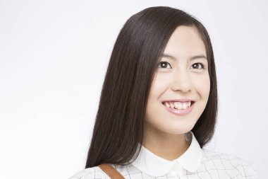 Uzun saçlı güzel Asyalı kadın portresi.