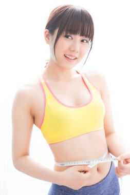 Asyalı kadının beline ölçme