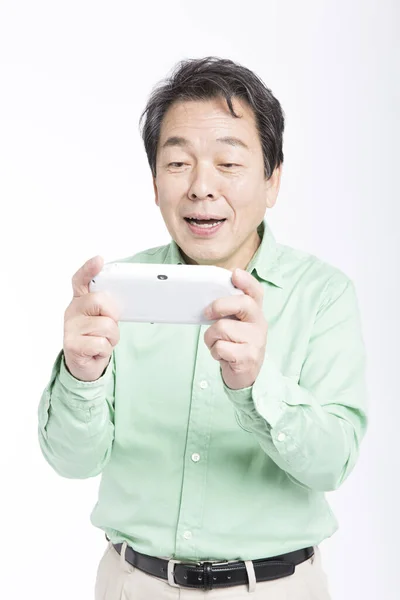 Starszy Azji Człowiek Grać Gry Wideo Izolowane Biały — Zdjęcie stockowe