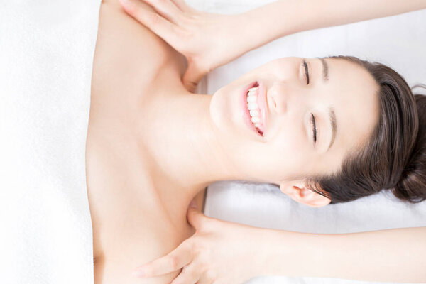  japanese woman getting  spa massage treatment at beauty spa salon