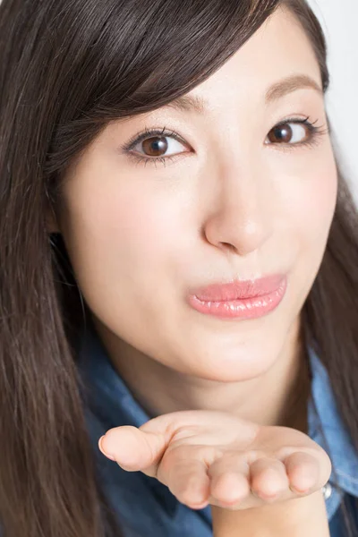 Young Asian Woman Blowing Kiss Closeup — Stock Photo, Image