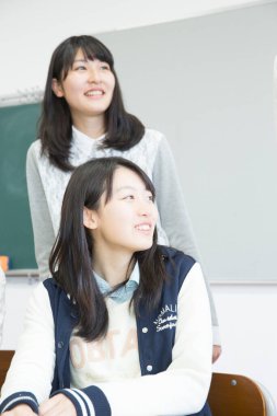 Asyalı genç bir öğrencinin portresi