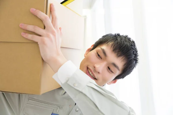 Young Japanese Man Carrying Box Office — Stock Photo, Image