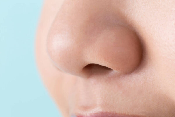asian woman nose close up of face part 