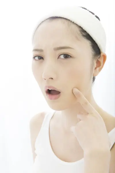 stock image beautiful asian woman doing skin care routine