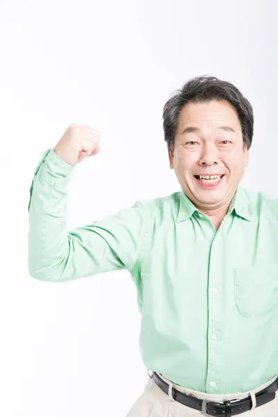 Starszy Azjatycki Biznesmen Świętujący Sukces — Zdjęcie stockowe